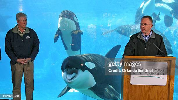 Jim Atchison, president and CEO SeaWorld Parks & Entertainment, speaks during a news conference Friday, February 26 with killer whales behind...