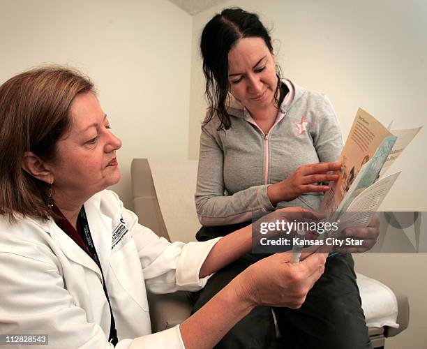 Amy Soto, right, visits the Samuel U. Rodgers Health Center in Kansas City, Missouri, October 20 for an annual test with Dr. Deborah Jantsch. Soto is...