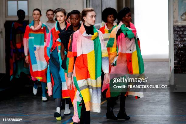 Models present creations by Issey Miyake during the Fall-Winter 2019/2020 Ready-to-Wear collection fashion show in Paris, on March 1, 2019.