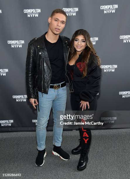 Ario Candelario and Milania Giudice attend the Cosmopolitan NYFW fashion show during New York Fashion Week at Tribeca 360 on February 08, 2019 in New...