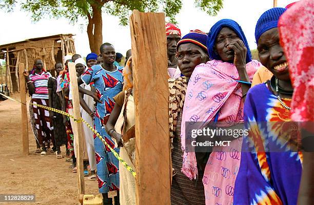 Long line of female voters cue to enter a polling center outside Terekeka, southern Sudan, April 11, 2010. Next January, Southerners are supposed to...