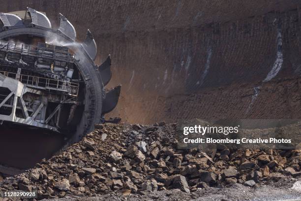 a bucket wheel excavates soil and rocks - lignite stock pictures, royalty-free photos & images