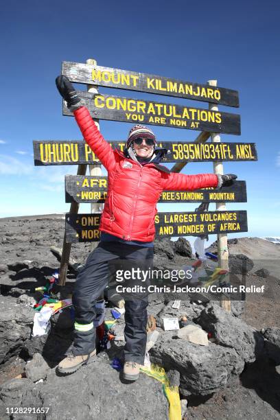 Anita Rani poses at the top of Mount Kilimanjaro during day seven of 'Kilimanjaro: The Return' for Red Nose Day on March 01, 2019 in Arusha,...