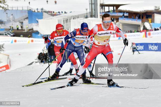 Alexander Bolshunov of Russia, Matti Heikkinen of Finland and Sjur Roethe of Norway during the Men's Cross Country Relay at the FIS Nordic World Ski...