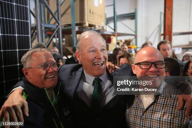 Washington Gov. Jay Inslee with his brothers Frank Inslee and Todd Inslee shortly after he announced his run for the 2020 Presidency at A & R Solar...