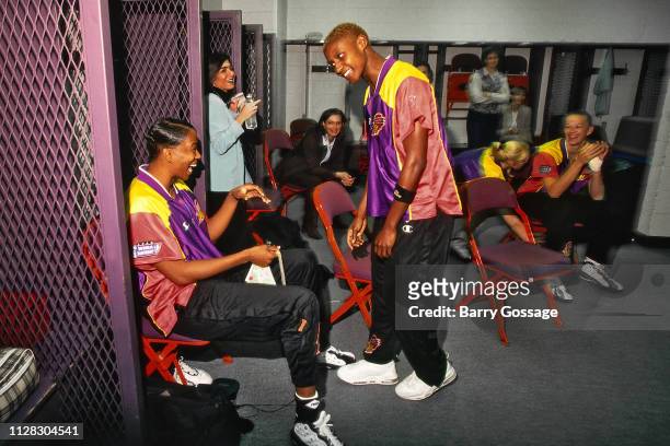 Bridget Pettis and Jennifer Gillom of the Phoenix Mercury talk in the lockerroom prior to Game Two of the 1998 WNBA Finals on August 29, 1998 at the...