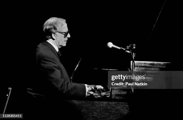 English Jazz musician George Shearing plays piano as he performs onstage at the Vic Theater, Chicago Illinois, May 26, 1985.