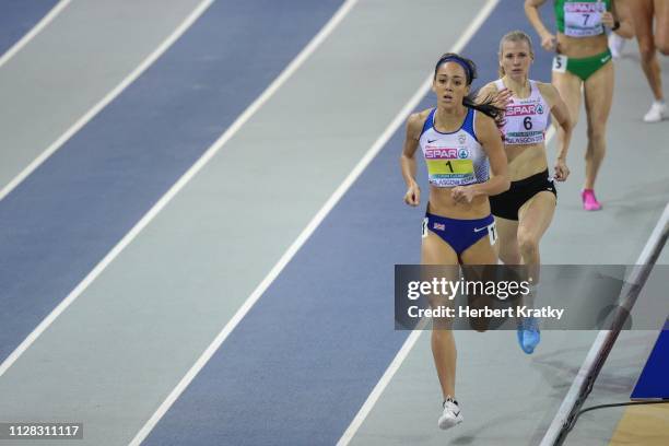 Katarina Johnson-Thompson of Great Britain and Verena Preiner of Austria compete in the 800m event of the women's pentathlon on March 1, 2019 in...