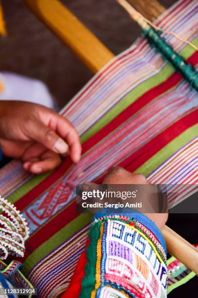 peruvian lady weaving on a backstrap loom - backstrap loom stock pictures, royalty-free photos & images