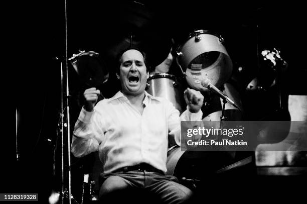 American Pop musician Neil Sedaka plays piano as he performs onstage at the Park West, Chicago, Illinois, November 25, 1978.