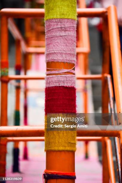 yarn bombed pole - knit bombing stock pictures, royalty-free photos & images