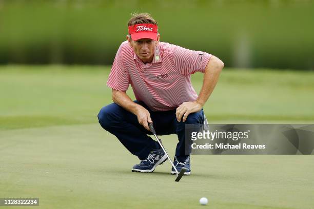 Brad Faxon looks over a putt on the third green during the first round of the Oasis Championship at The Old Course at Broken Sound on February 08,...