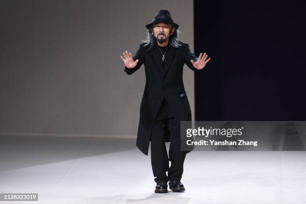 Designer Yohji Yamamoto walks the runway during the Yohji Yamamoto show as part of the Paris Fashion Week Womenswear Fall/Winter 2019/2020 on March...