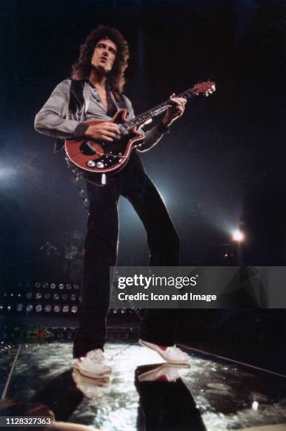 English singer, songwriter and lead guitarist for the rock band Queen, Brian May, onstage at Cobo Arena, on November 18 in Detroit, Michigan.