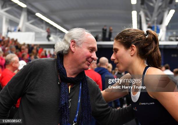 Johanna Konta of Great Britain embraces her father after winning during Day Three of the Fed Cup Europe and Africa Zone Group I at the University of...