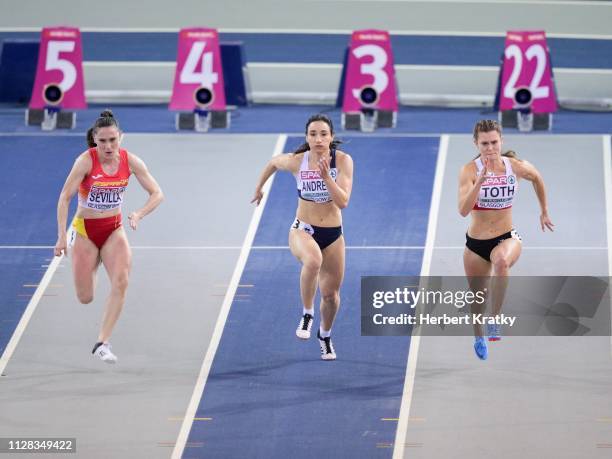 Paula Sevilla of Spain, Paraskevi Andreou of Cyprus and Alexandra Toth of Austria compete in the qualification races of the women's 60m event on...