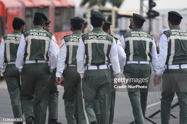 Members of Dubai Police forces seen the start line of the seventh and final stage - Dubai Stage of the UAE Tour 2019, a 145km with a start from Dubai...