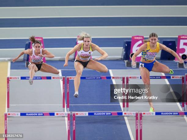 Stephanie Bendrat of Austria, Cindy Roleder of Germany and Hanna Plotitsyna of the Ukraine compete in the qualification races of the women's 60m...