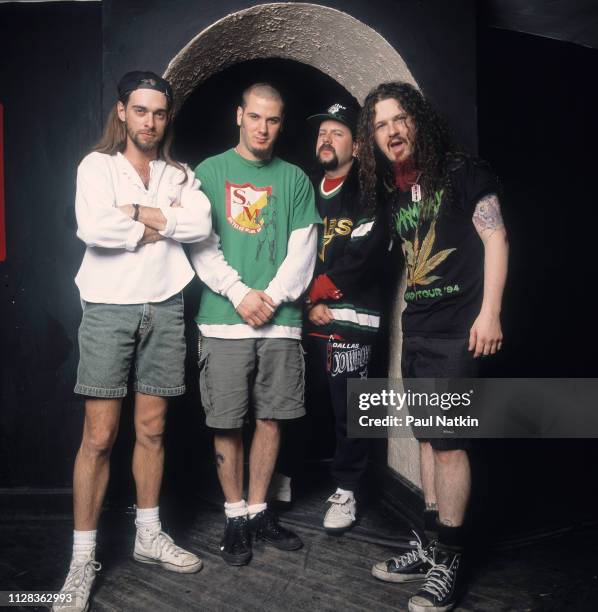 Portrait of American Rock group Pantera backstage at the Aragon Ballroom, Chicago, Illinois, March 4, 1993. Pictured are, from left, Rex Brown, Phil...