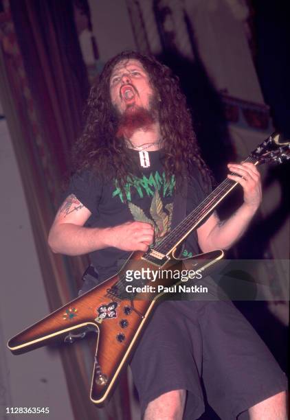American Rock musician Dimebag Darrell , of the group Pantera, plays guitar as he performs onstage at the Aragon Ballroom, Chicago, Illinois, March...