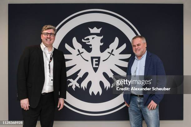 Eugene Kaspersky , Chief Executive Officer at KL, and Axel Hellmann , Board Member at Eintracht Frankfurt, stay next to each other in front of the...