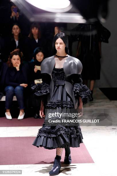 Model presents a creation by Comme des Garcons during the Women's Fall-Winter 2019/2020 Ready-to-Wear collection fashion show in Paris, on March 2,...