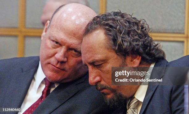 Scott Brancheau, right, husband of SeaWorld trainer Dawn Brancheau, talks with attorney Jon Mills, Wednesday, March 24, 2010 during a court hearing...