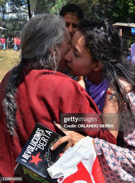 Austra Berta Caceres mother of Honduran late environmentalist Berta Caceres, embraces her granddaughter Berta Zuniga Caceres, as she arrives at the...