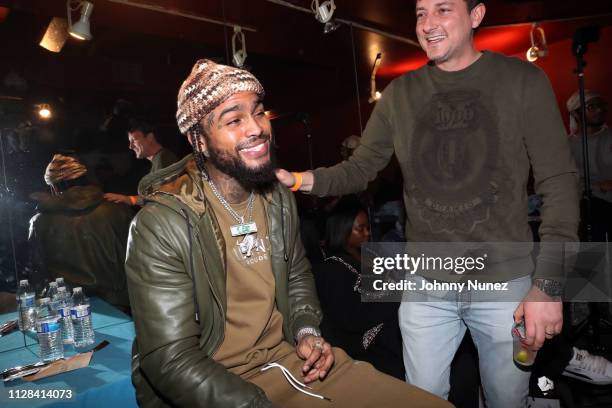 Dave East and CEO of Mass Appeal Peter Bittenbender backstage at the Mass Appeal "Starting 5" Tour at S.O.B.'s on March 1, 2019 in New York City.