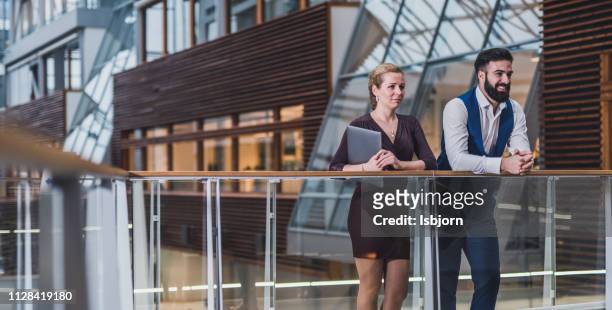 business people talking about next meeting. - businesswear stock pictures, royalty-free photos & images