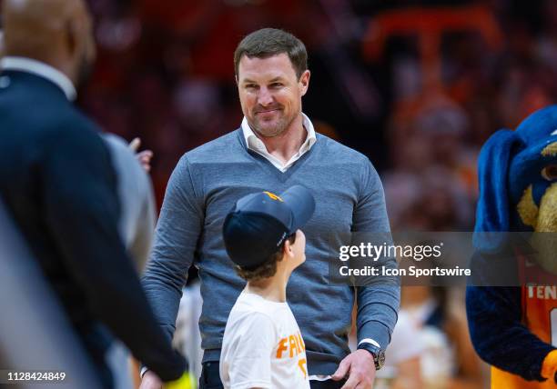 Former Tennessee Volunteers football player Jason Witten is honored during a college basketball game between the Tennessee Volunteers and Kentucky...