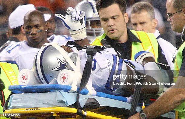 Dallas Cowboys DeMarcus Ware signals thumbs up as he is removed from the field in the fourth quarter with a neck injury against the San Diego...