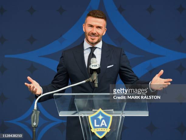Former Los Angeles Galaxy midfielder David Beckham speaks at an event to unveil a new statue of him at the Legends Plaza in Carson, California on...