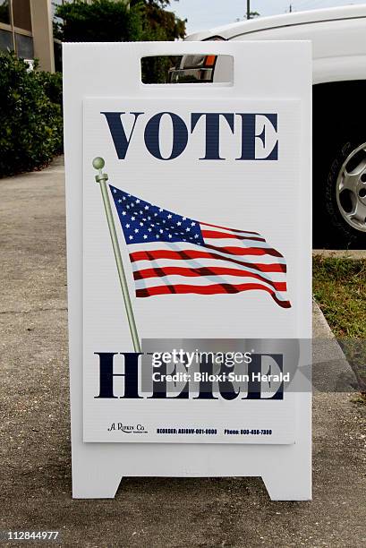 Vote Here" sign leads voters to the New Popps Ferry precinct at the Gulf Coast Business Technology Center in Biloxi, Miss, on Tuesday, Nov. 2, 2010.