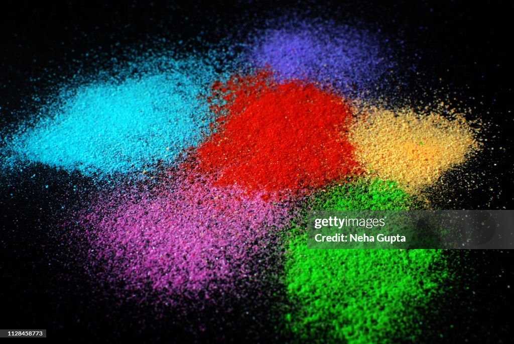 Colourful Powder Paint Explosion Against A Black Background High-Res ...