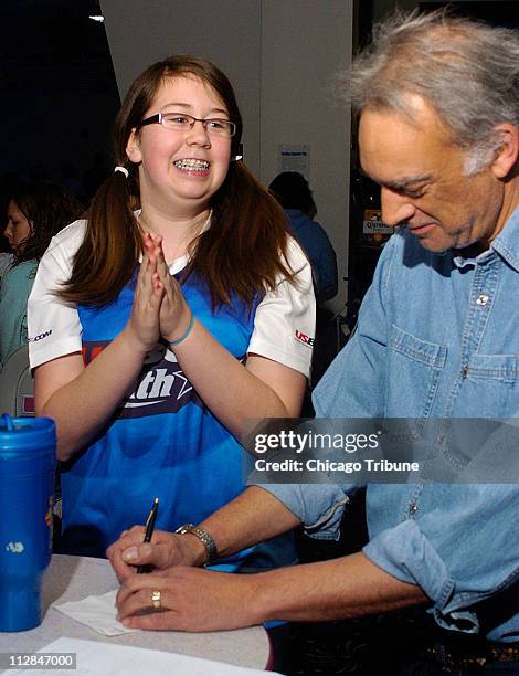 Rachael Rousseau reacts as she watches her father, Lee Rousseau, write down her high bowling score at Northern Lights Recreation Center near Harbor...