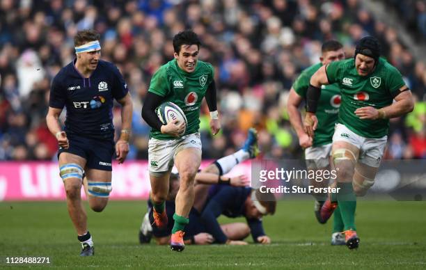 Ireland player Joey Carbery makes a break to set up the third Ireland try during the Guinness Six Nations match between Scotland and Ireland at...