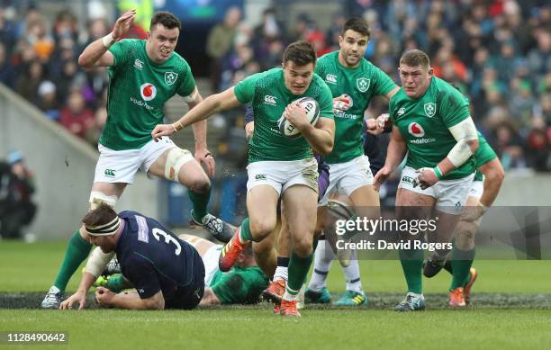 Jacob Stockdale of Ireland breaks clear to score their second try during the Guinness Six Nations match between Scotland and Ireland at Murrayfield...