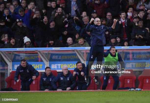 Martin O'Neill of Nottingham Forest jumps in celebration as Molla Wague scores the second goal during the Sky Bet Championship match between...