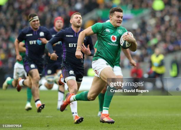 Jacob Stockdale of Ireland breaks clear to score their second try during the Guinness Six Nations match between Scotland and Ireland at Murrayfield...