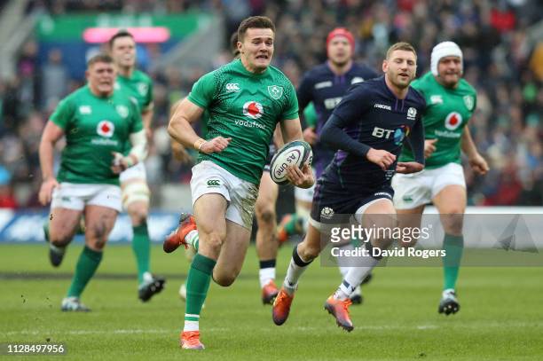 Jacob Stockdale of Ireland breaks clear to score their second try during the Guinness Six Nations match between Scotland and Ireland at Murrayfield...
