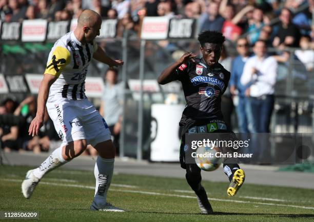 March 03: Gernot Trauner of LASK and Gideon Mensah of Strum Graz in action during the tipico Bundesliga match between SK Sturm Graz and LASK Linz at...