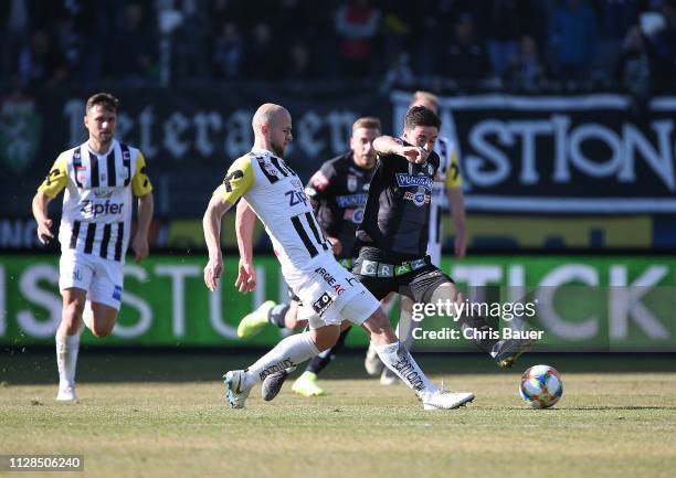 March 03: Gernot Trauner of LASK, Otar Kiteishvilli of Sturm Graz in action during the tipico Bundesliga match between SK Sturm Graz and LASK Linz at...