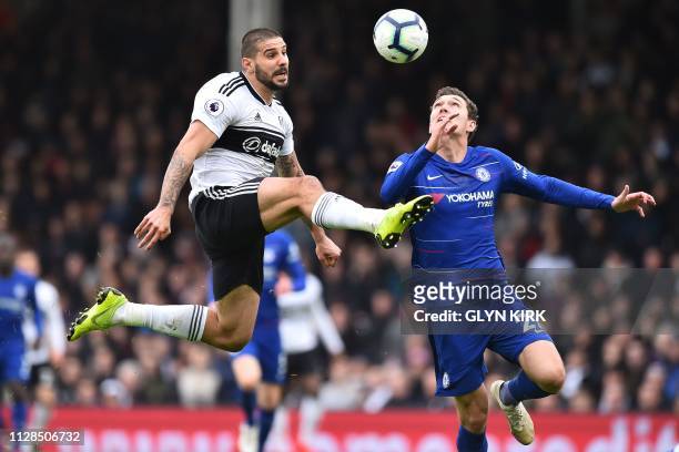 Fulham's Serbian striker Aleksandar Mitrovic vies with Chelsea's Danish defender Andreas Christensen during the English Premier League football match...