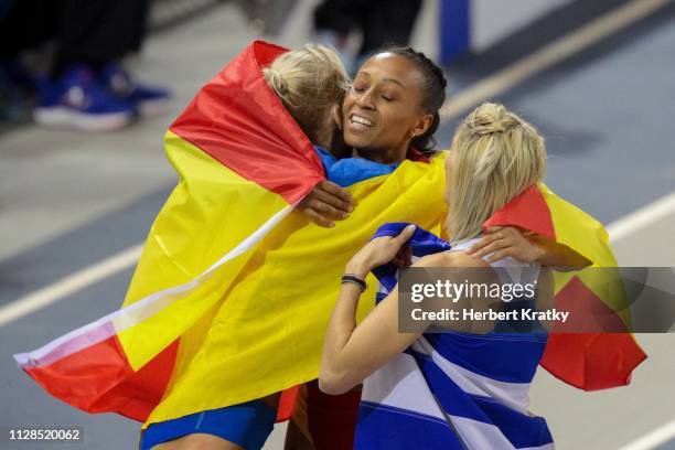 Olha Saladukha of the Ukraine, Ana Peleteiro of Spain and Paraskevi Paphristou of Greece compete in the women's triple jump event on March 3, 2019 in...