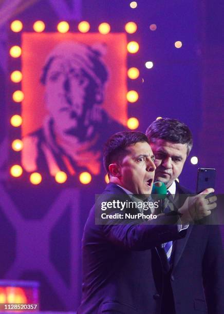 File photo) Ukrainian comedian actor Volodymyr Zelensky acts at a stage during the recording of his &quot;Evening Quarter&quot; comedian concert in...