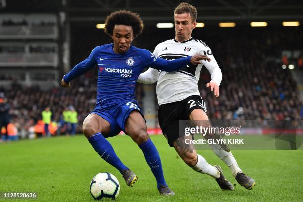 Chelsea's Brazilian midfielder Willian vies with Fulham's English defender Joe Bryan during the English Premier League football match between Fulham...