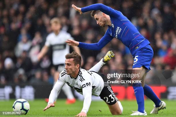 Fulham's English defender Joe Bryan vies with Chelsea's Italian midfielder Jorginho during the English Premier League football match between Fulham...