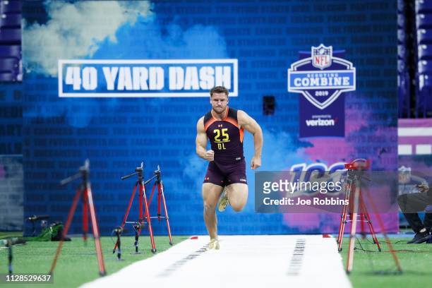 Defensive lineman Nick Bosa of Ohio State runs the 40-yard dash during day four of the NFL Combine at Lucas Oil Stadium on March 3, 2019 in...