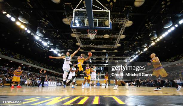 Justin Robinson guard for London Lions scores during the British Basketball League match between London Lions and Manchester Giants at The Copper Box...